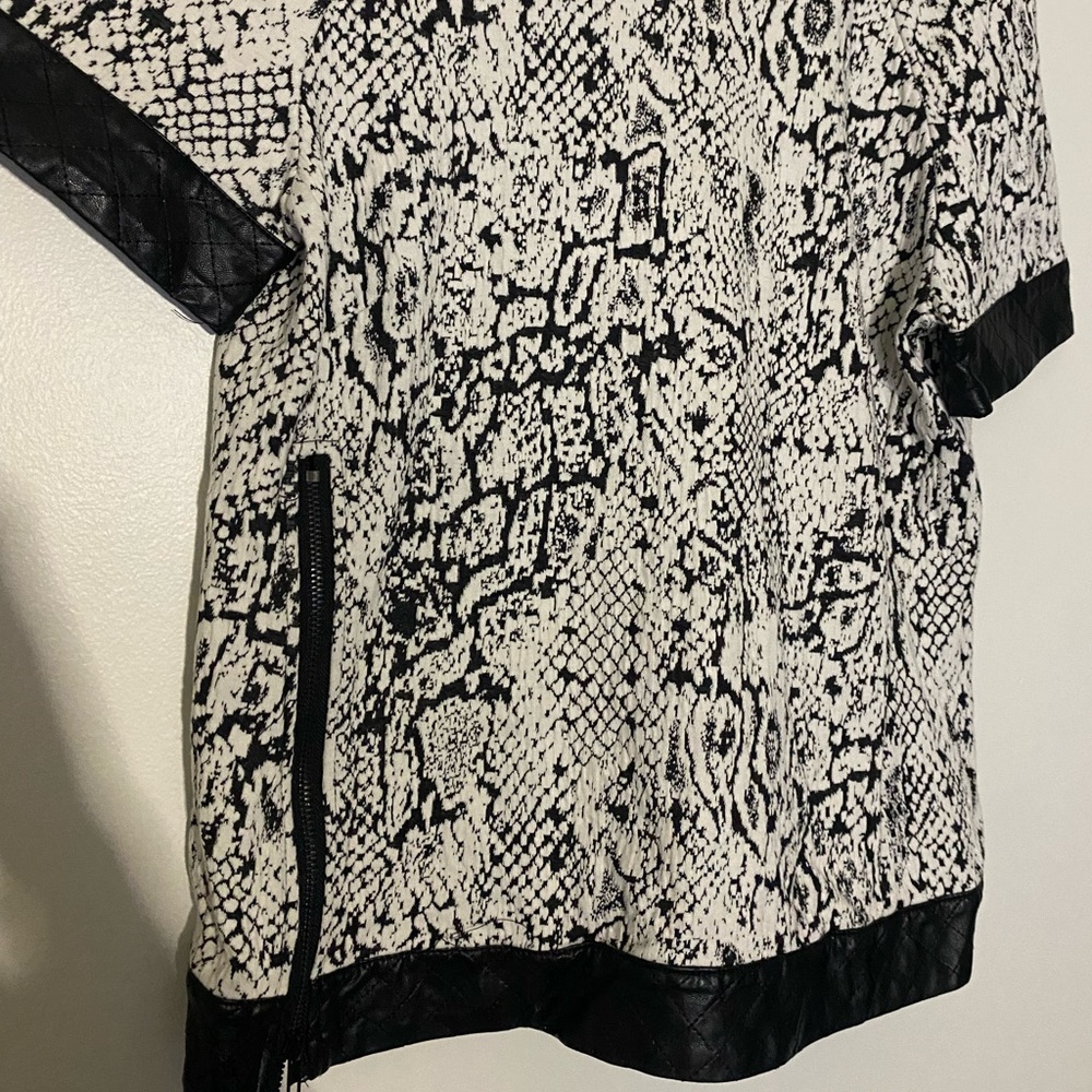 #19 811 by Walter baker faux leather/ snake blouse